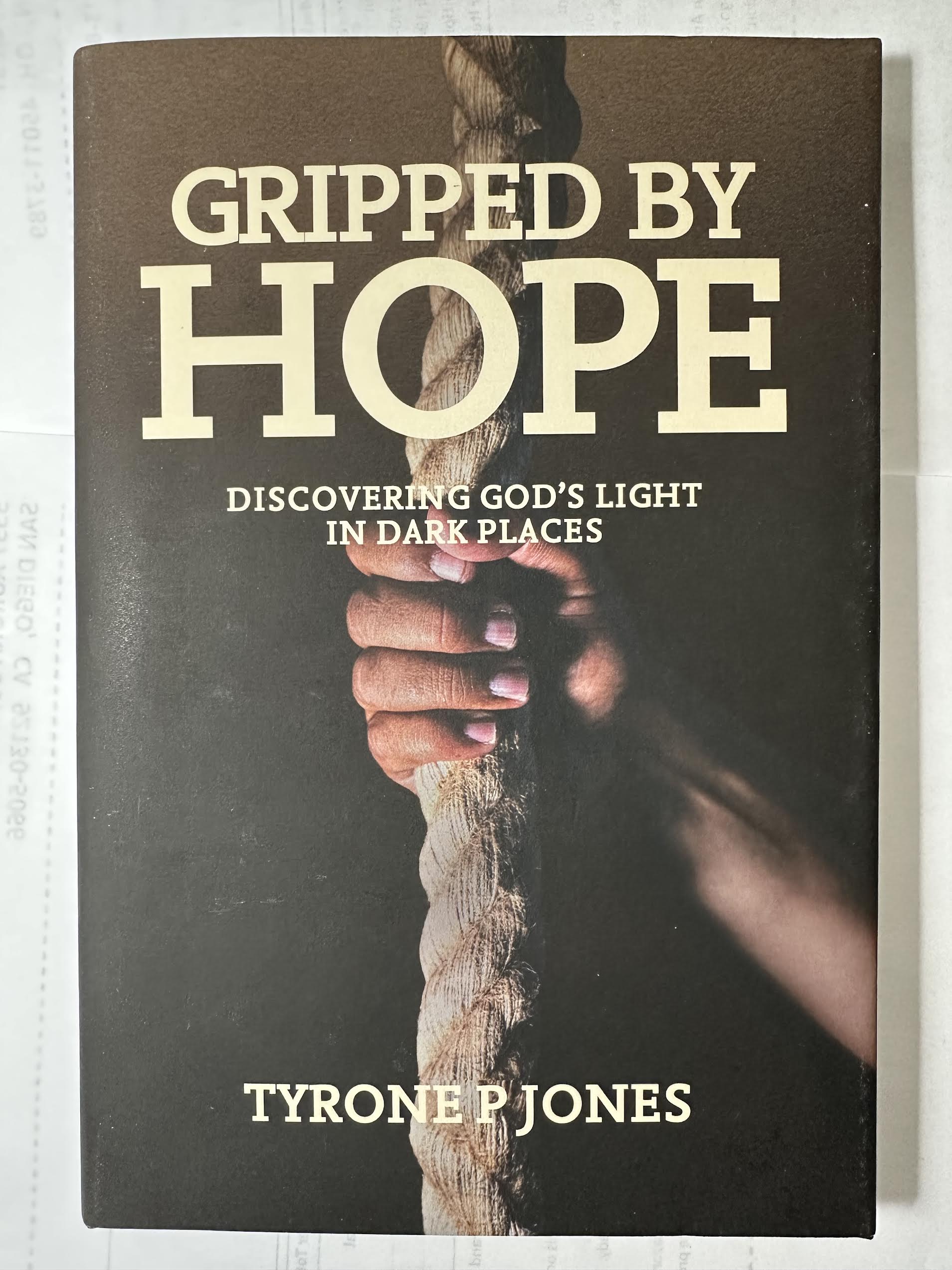 Gripped By Hope: DISCOVERING GOD'S LIGHT IN DARK PLACES